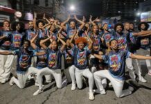 Carregada no dendê, a Portela volta à rua com o canto quente da comunidade